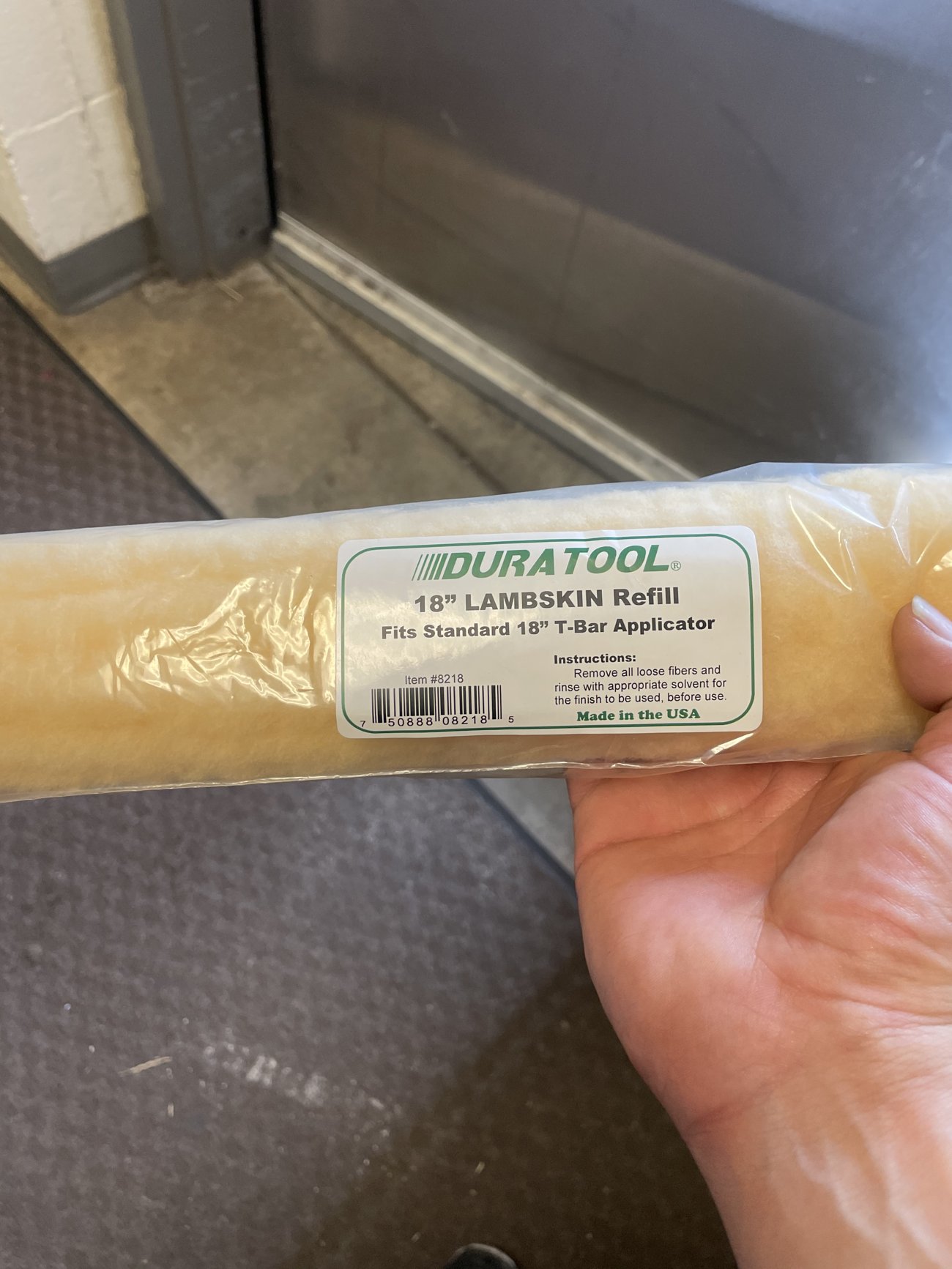 18-inch T-bar lambskin applicator used to apply gym floor finish